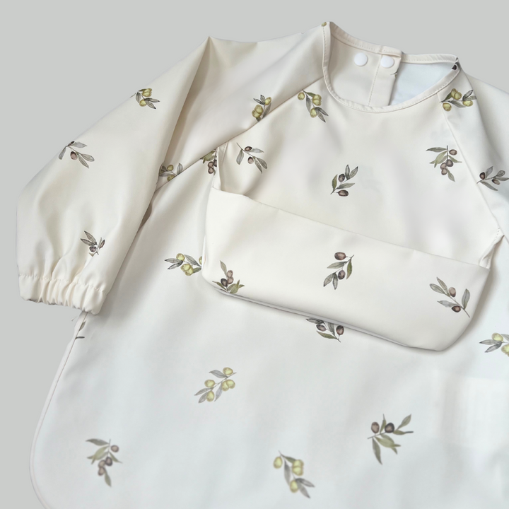 Classic High Pocket Long Sleeve Waterproof Bib – toddler feeding smock – activity smock – painting smock – craft apron – sensory play smock – BLW bib – daycare essential – ethically made – sustainably crafted from recycled polyester – made using approx. 8 recycled water bottles – eco-friendly Canadian baby brand – parenting hacks – first time mom must-have