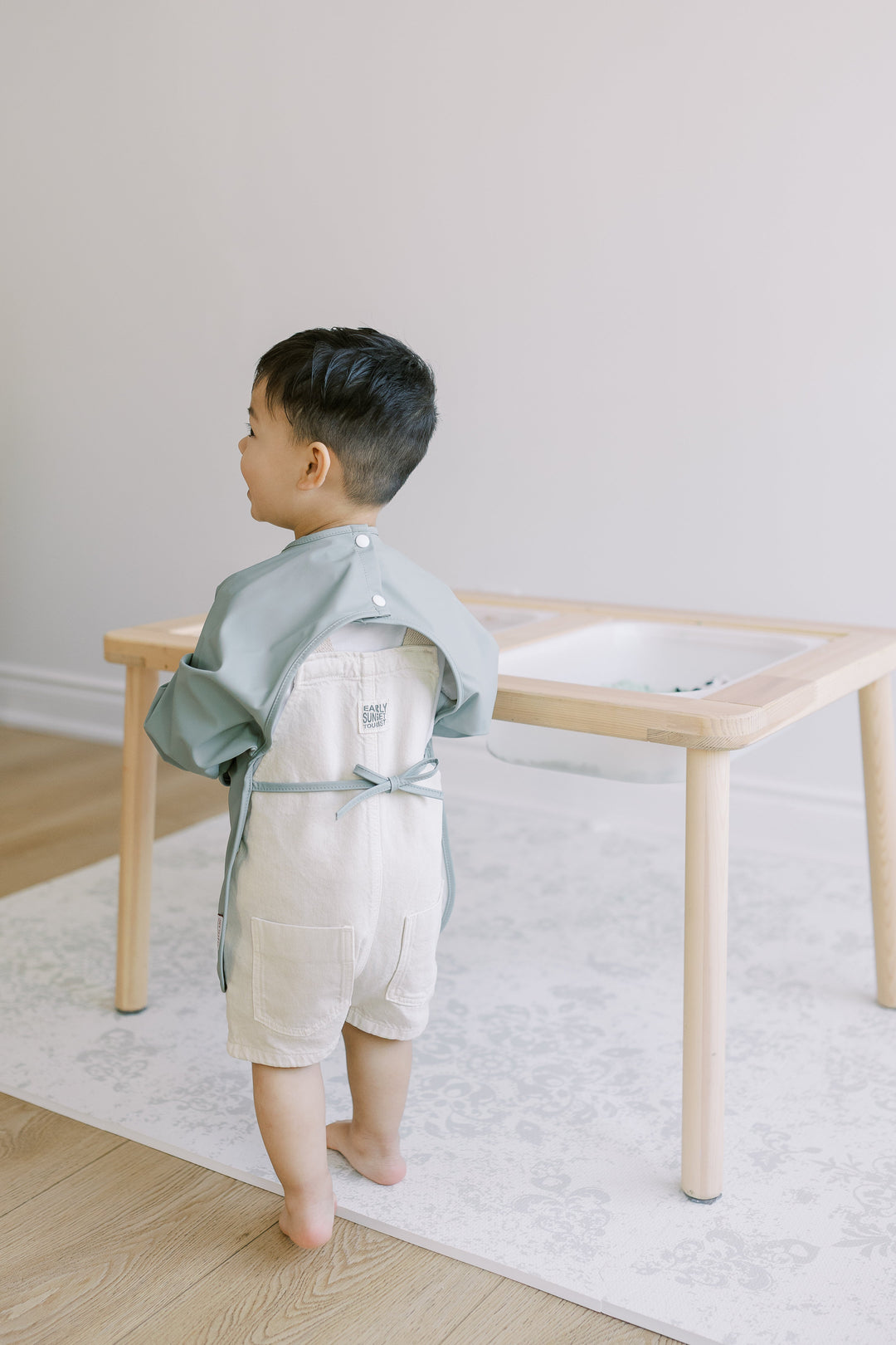 Classic High Pocket Long Sleeve Waterproof Bib – toddler feeding smock – activity smock – painting smock – craft apron – sensory play smock – BLW bib – daycare essential – ethically made – sustainably crafted from recycled polyester – made using approx. 8 recycled water bottles – eco-friendly Canadian baby brand – parenting hacks – first time mom must-have